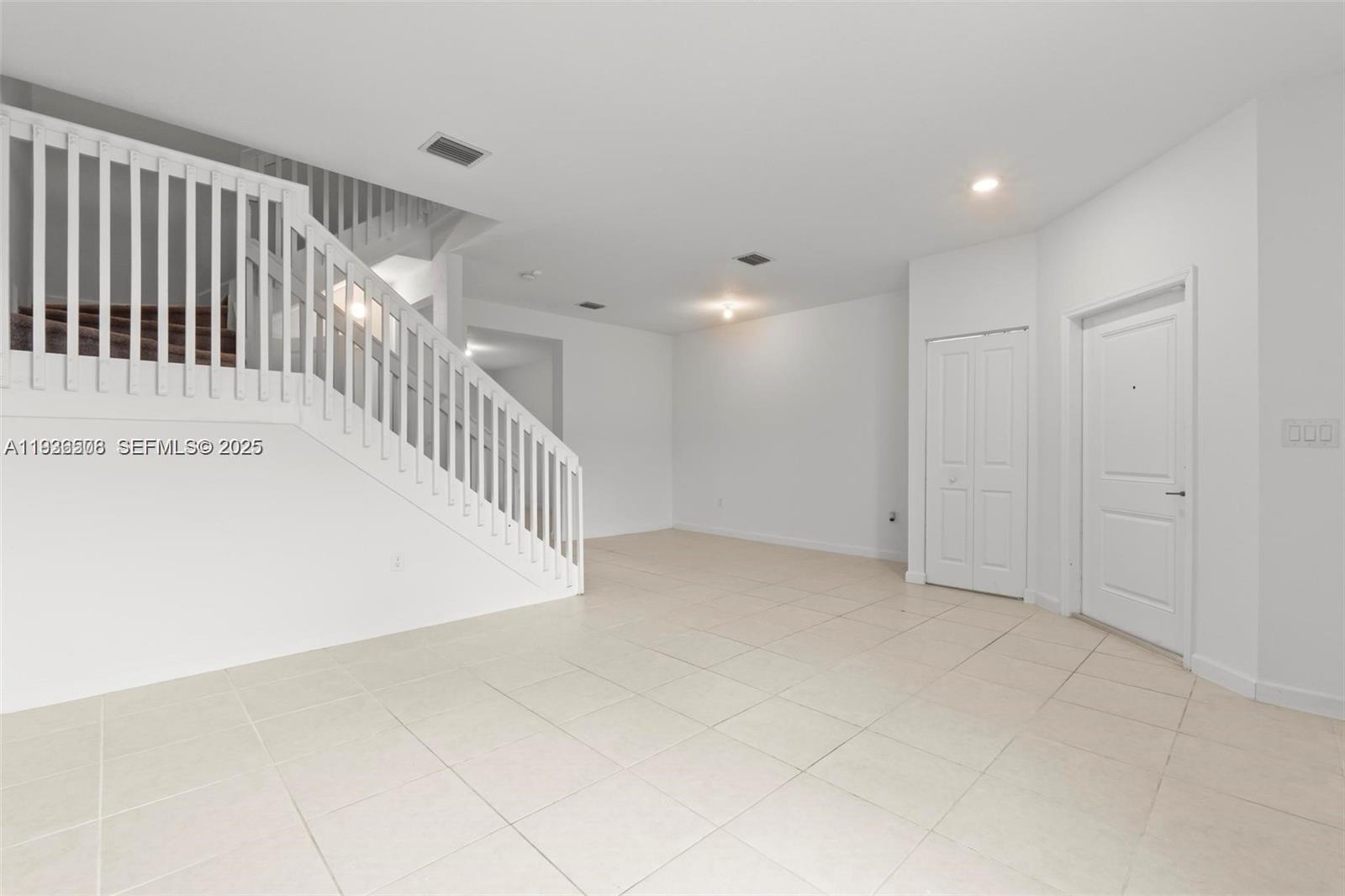 2668 Southeast 19th Street Homestead, FL 33035 - Photo 10 of 37 a view of an entryway with stairs