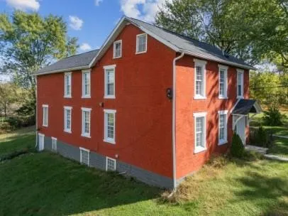 a backyard of a house with lots of green space