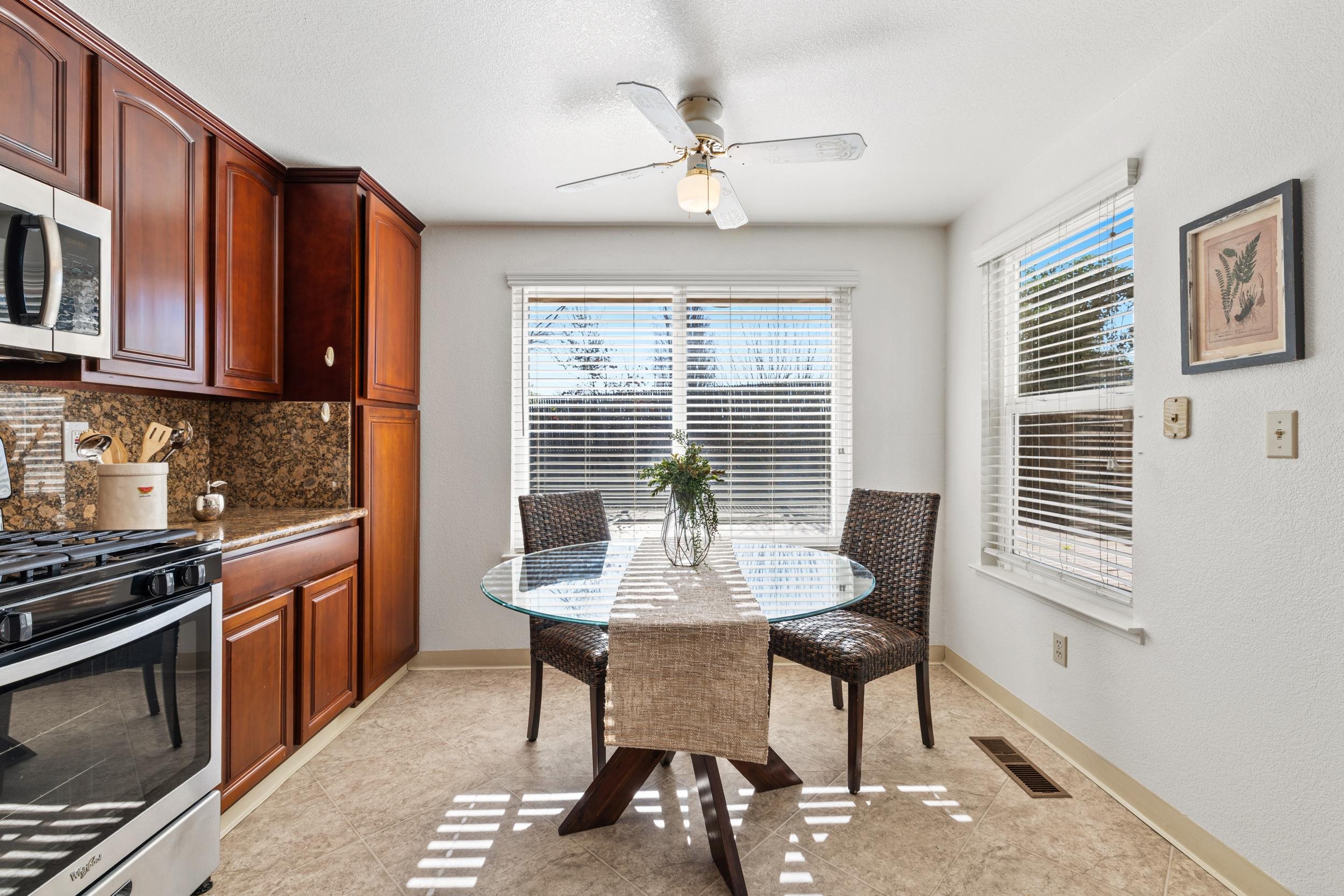 2832 Filbert Street Antioch, CA 94509 - Photo 14 of 40 a view of a dining room with furniture window and wooden floor