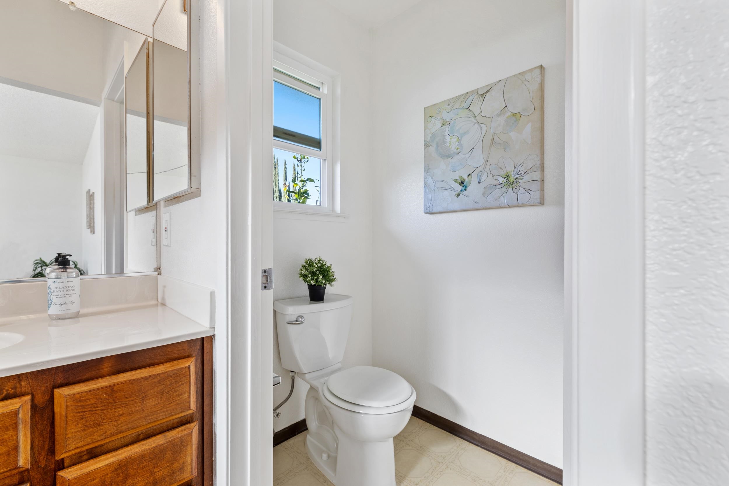 2832 Filbert Street Antioch, CA 94509 - Photo 19 of 40 a white toilet sitting next to a bathroom sink
