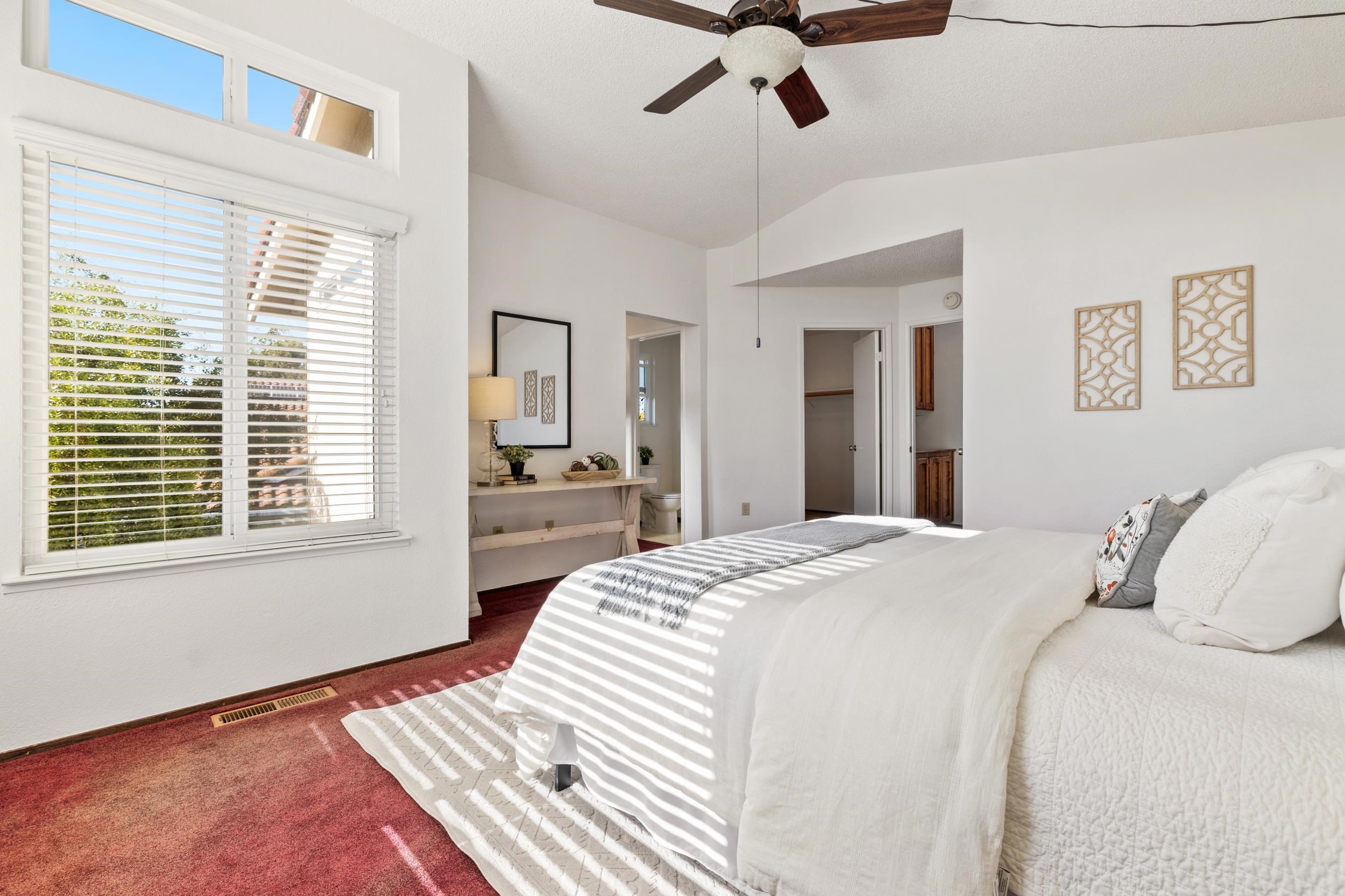 2832 Filbert Street Antioch, CA 94509 - Photo 25 of 40 a bedroom with a large bed and a window