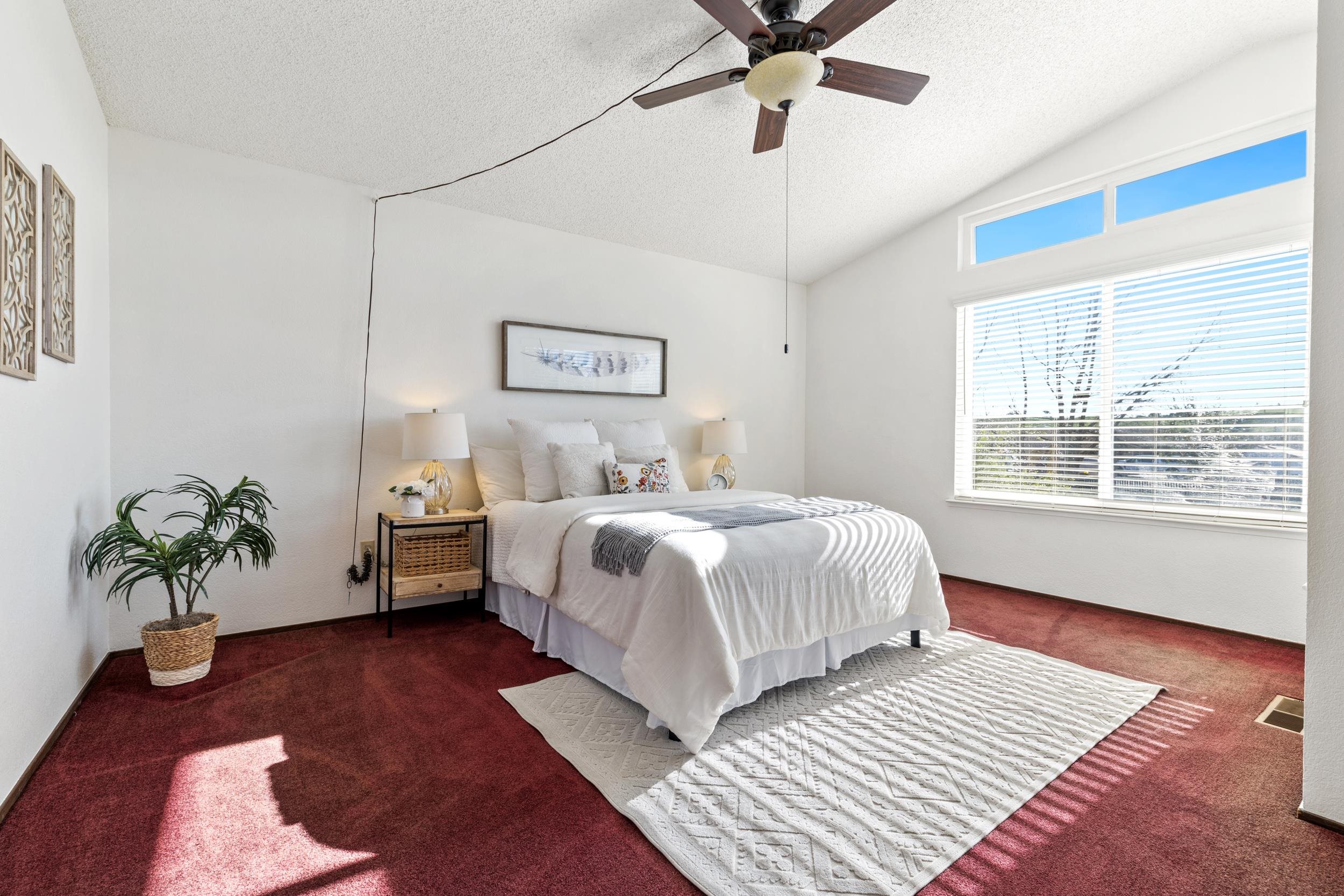 2832 Filbert Street Antioch, CA 94509 - Photo 26 of 40 a bedroom with a large bed and a couch