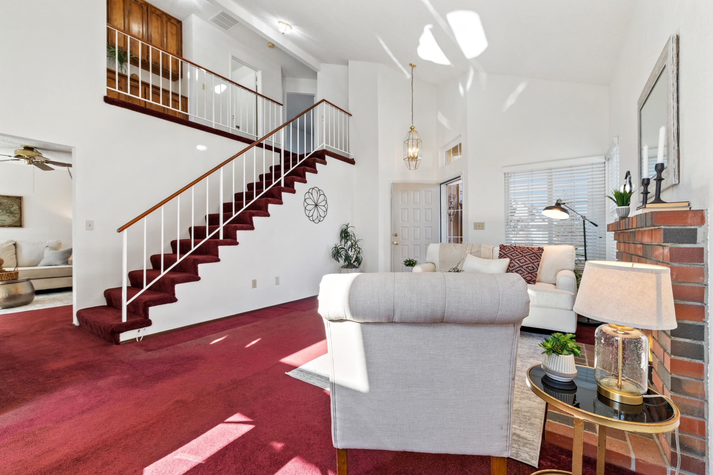 2832 Filbert Street Antioch, CA 94509 - Photo 5 of 40 a living room with furniture and a chandelier