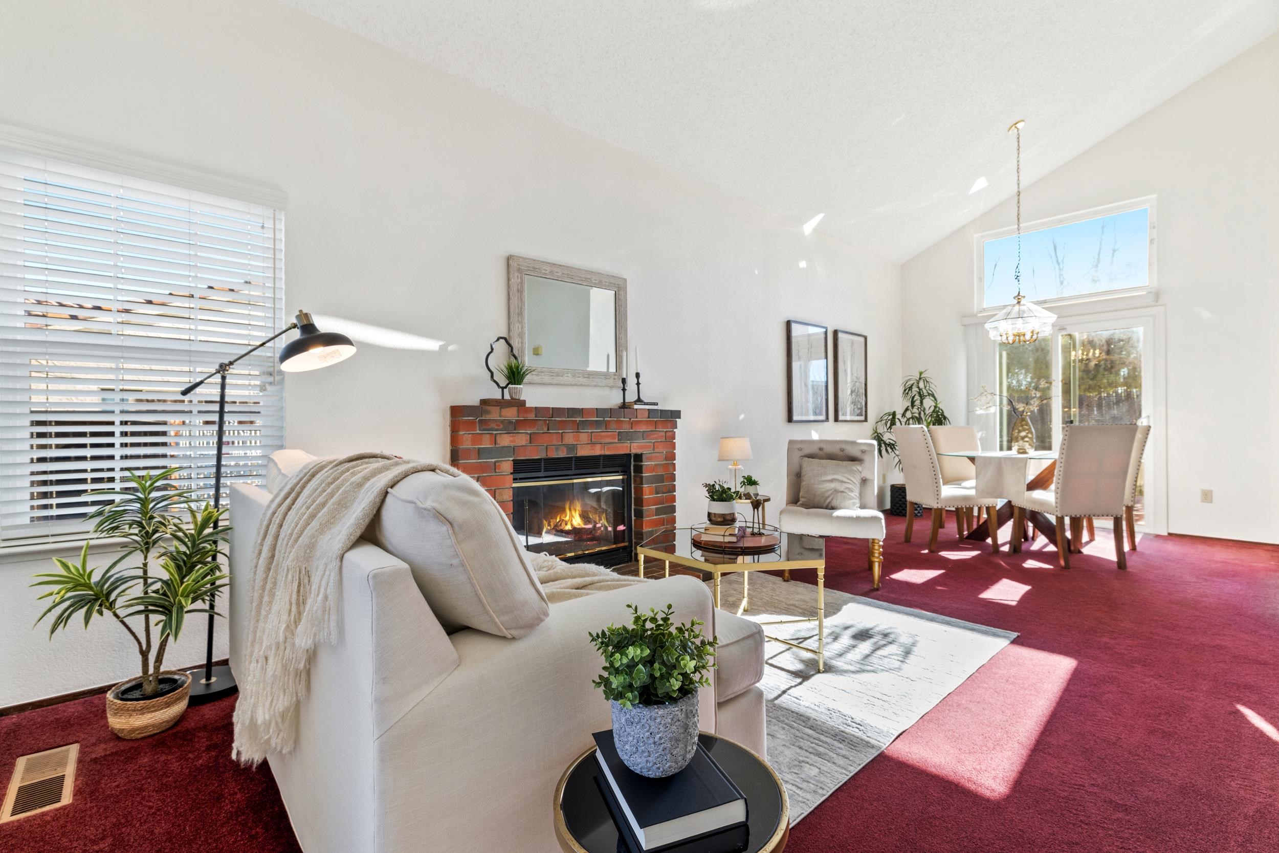 2832 Filbert Street Antioch, CA 94509 - Photo 6 of 40 a living room with furniture a fireplace and potted plants
