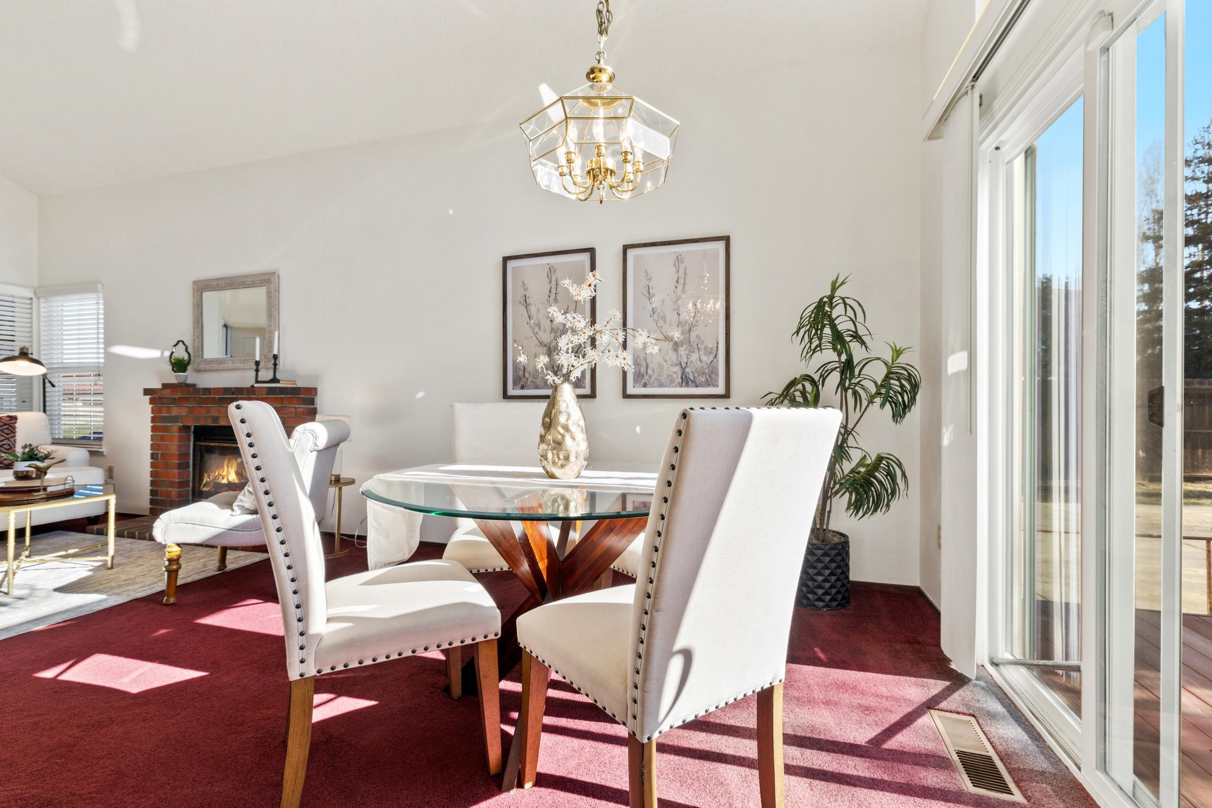 2832 Filbert Street Antioch, CA 94509 - Photo 7 of 40 a view of a dining room with furniture a chandelier and a window