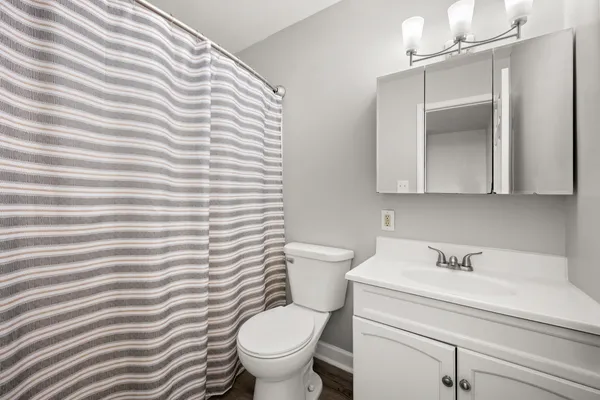 a bathroom with a sink and a toilet