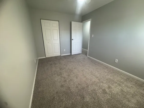 an empty room with windows