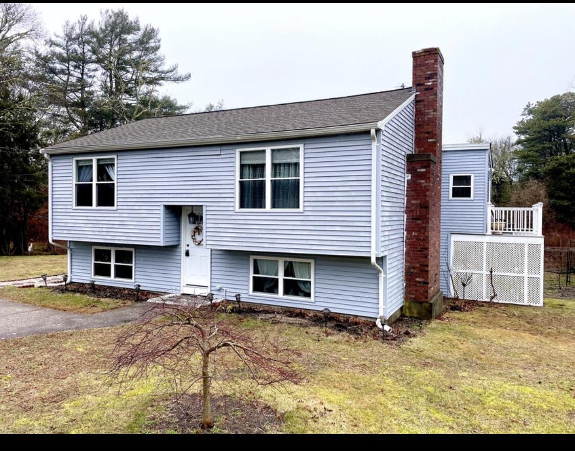 8 Scraggy Neck Rd Extension Cataumet, MA 02534 - Photo 1 of 19 a backyard of a house with barbeque oven