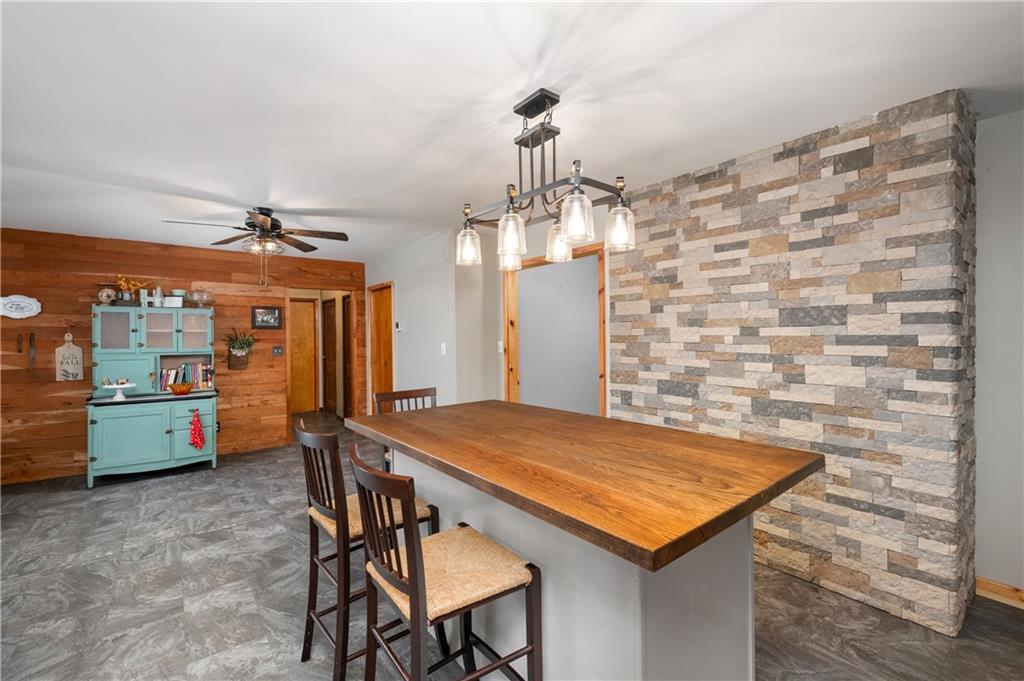 222 Dick Road Prospect, PA 16052 - Photo 11 of 29 a dining room with a table and chairs
