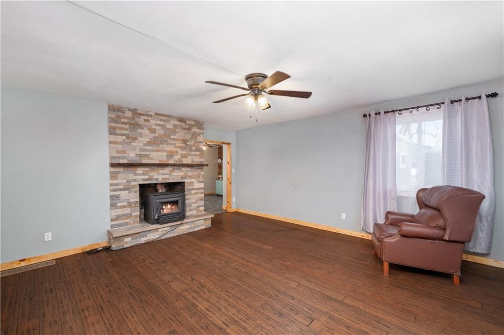 222 Dick Road Prospect, PA 16052 - Photo 16 of 29 a living room with furniture and a fireplace