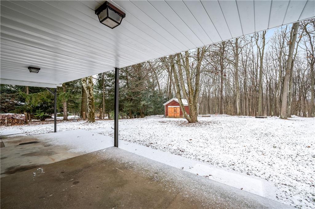 222 Dick Road Prospect, PA 16052 - Photo 28 of 29 a backyard of a house with a slide