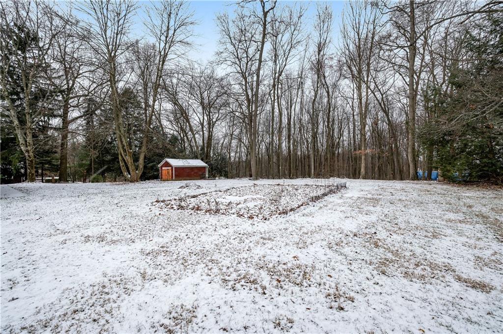 222 Dick Road Prospect, PA 16052 - Photo 29 of 29 a house covered with snow in outdoor space