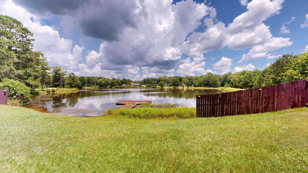 1278 Jones Road Cataula, GA 31804 - Photo 3 of 94 a view of a lake with houses in the back
