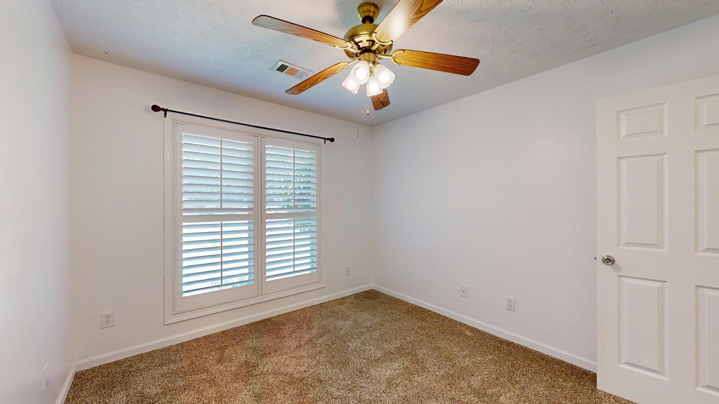 1278 Jones Road Cataula, GA 31804 - Photo 37 of 94 an empty room with windows and fan