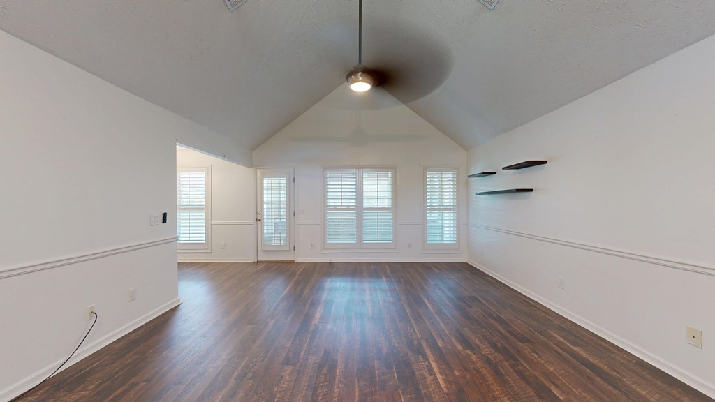 1278 Jones Road Cataula, GA 31804 - Photo 4 of 94 an empty room with wooden floor and windows