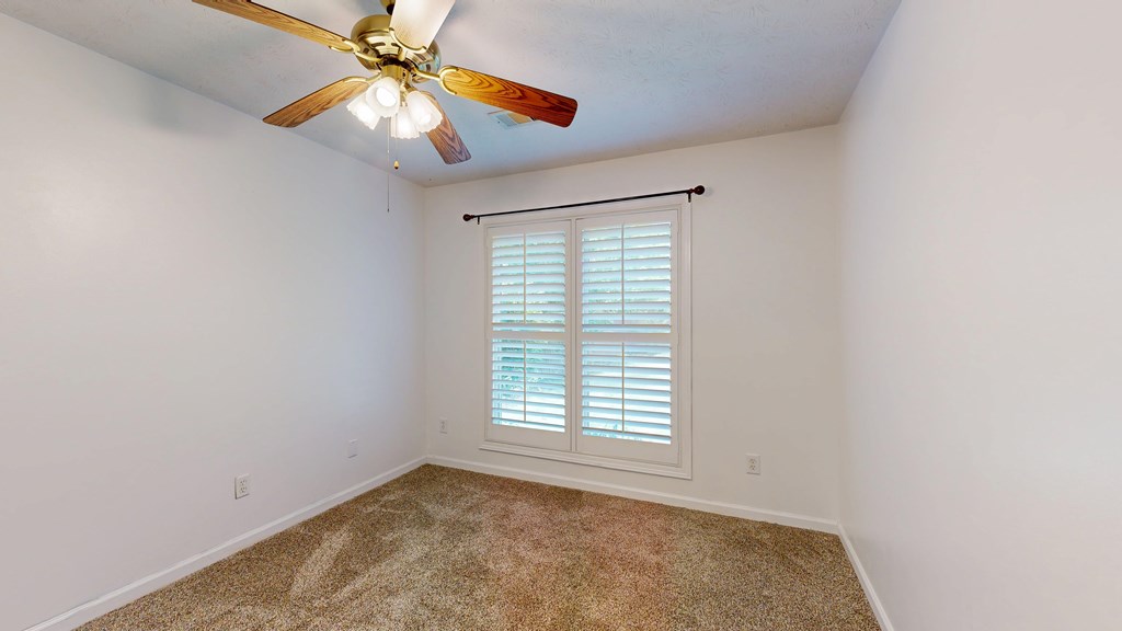 1278 Jones Road Cataula, GA 31804 - Photo 48 of 94 an empty room with windows and fan