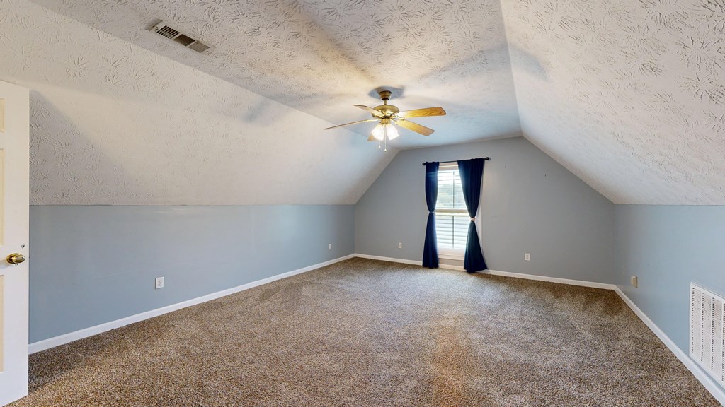 1278 Jones Road Cataula, GA 31804 - Photo 57 of 94 wooden floor in an empty room with a window