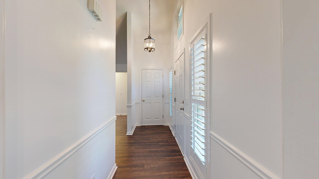 1278 Jones Road Cataula, GA 31804 - Photo 61 of 94 a view of a hallway with wooden floor and entryway