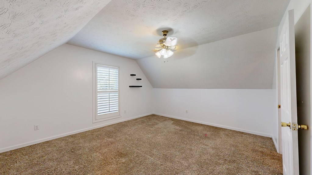 1278 Jones Road Cataula, GA 31804 - Photo 72 of 94 an empty room with windows and fan