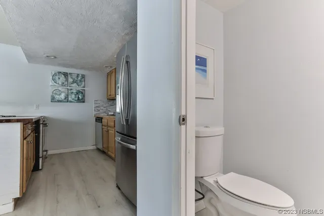 a bathroom with a toilet sink and tub