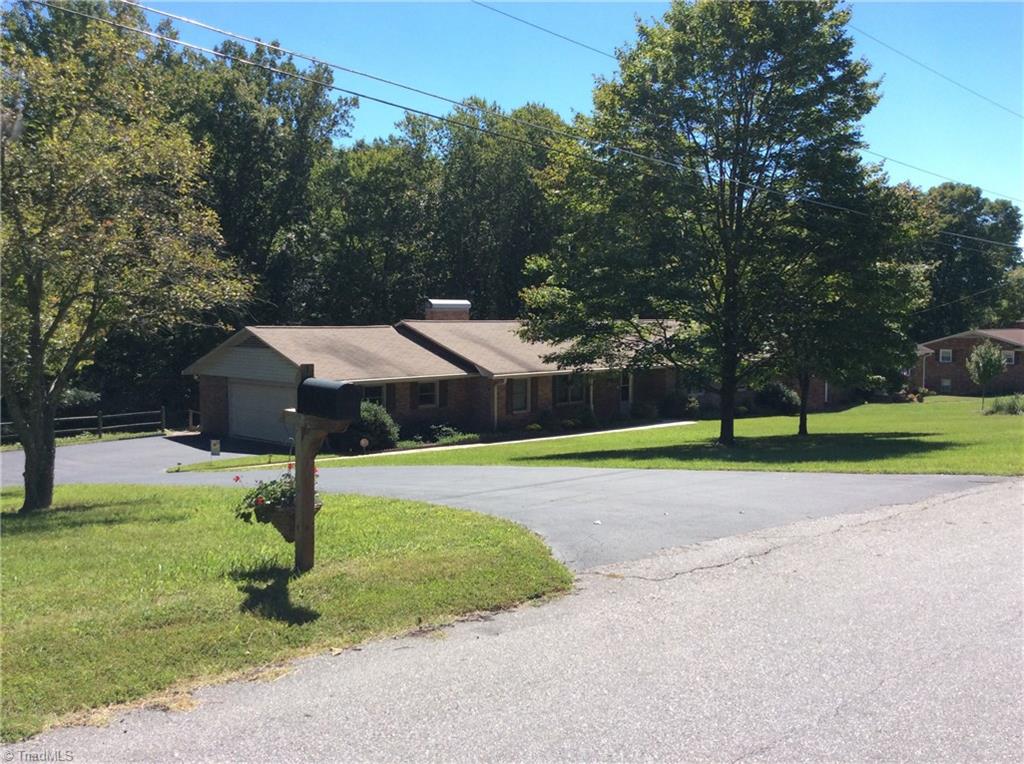 335 Doub Road Lewisville, NC 27023 - Photo 1 of 27 Handsome brick rancher on Doub dead end road in LEWISVILLE over 1.4 acres priced under tax value