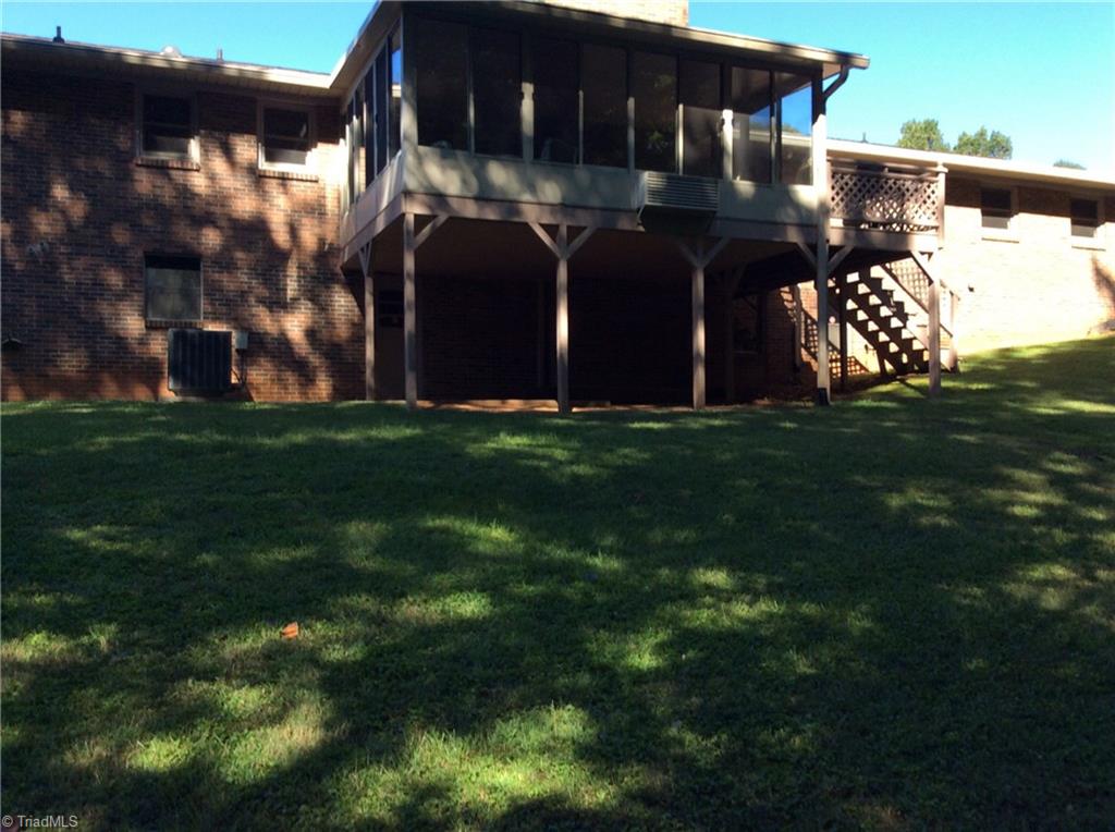 335 Doub Road Lewisville, NC 27023 - Photo 2 of 27 East facing sun porch and deck for morning enjoyment