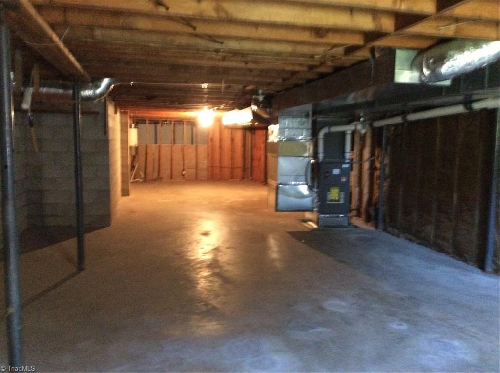335 Doub Road Lewisville, NC 27023 - Photo 21 of 27 Nice clean and dry basement 2012 new heat pump