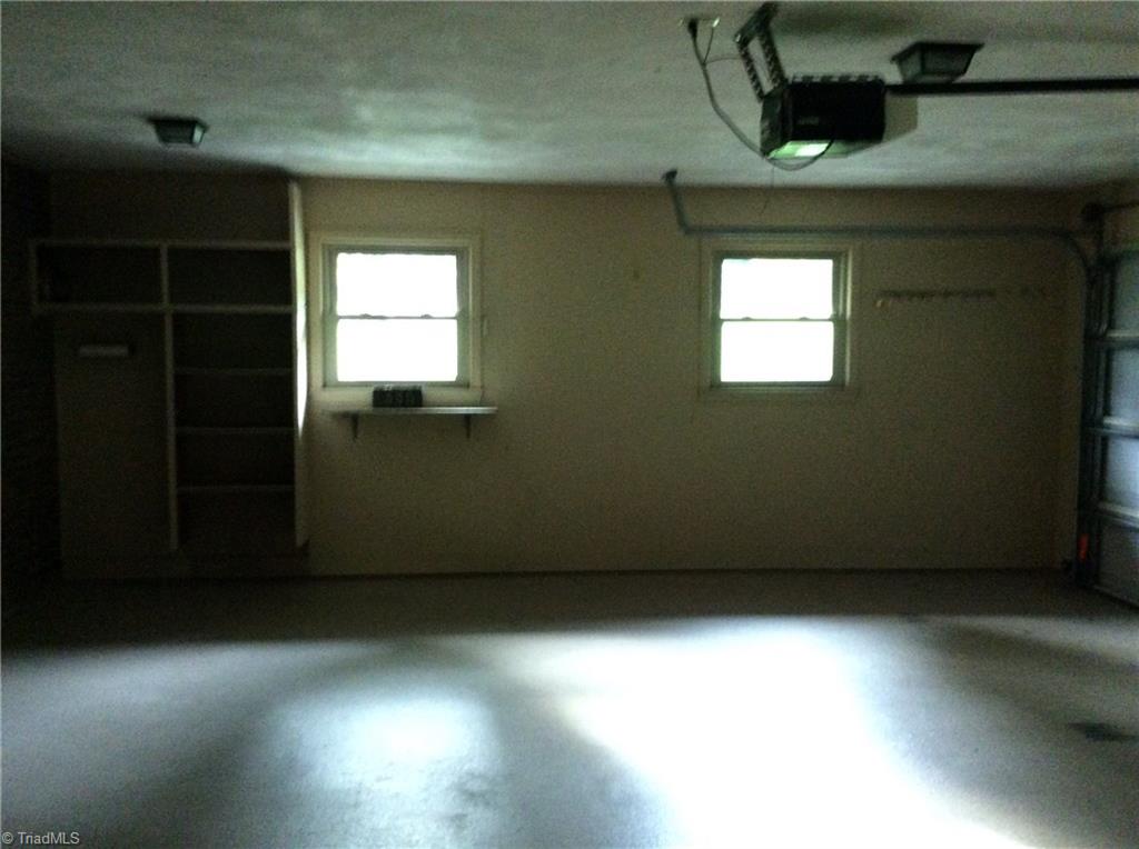 335 Doub Road Lewisville, NC 27023 - Photo 27 of 27 Garage with built-ins and windows