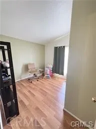 a room with furniture and a flat screen tv