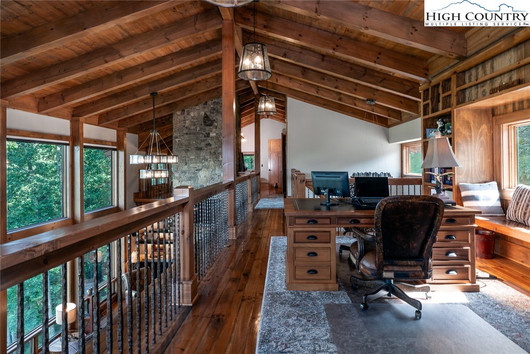 550 Pepperroot Road Boone, NC 28607 - Photo 20 of 50 a view of a workspace with furniture and a window