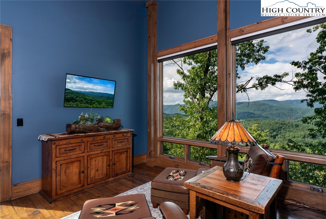 550 Pepperroot Road Boone, NC 28607 - Photo 22 of 50 a living room with furniture a rug and a window