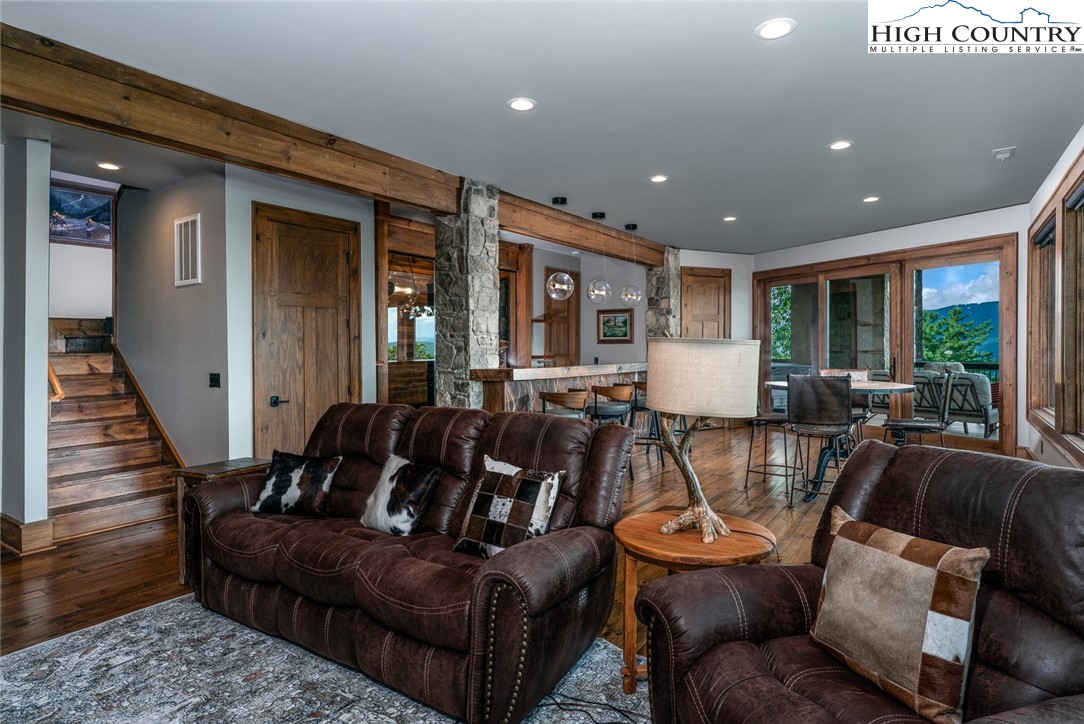 550 Pepperroot Road Boone, NC 28607 - Photo 31 of 50 a living room with furniture and wooden floor