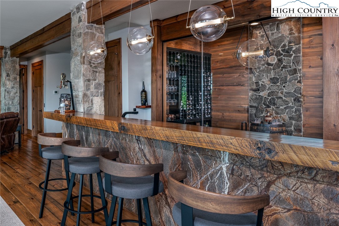 550 Pepperroot Road Boone, NC 28607 - Photo 32 of 50 a view of a chair and tables in the balcony