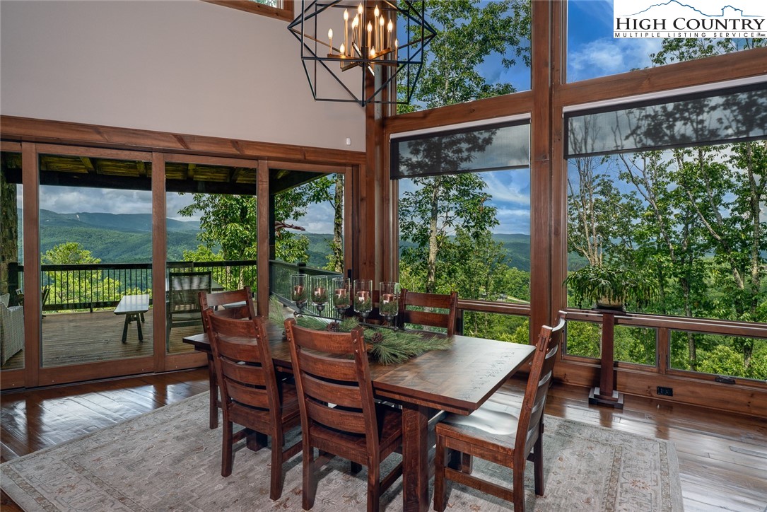 550 Pepperroot Road Boone, NC 28607 - Photo 8 of 50 a view of a patio with a table chairs and a backyard
