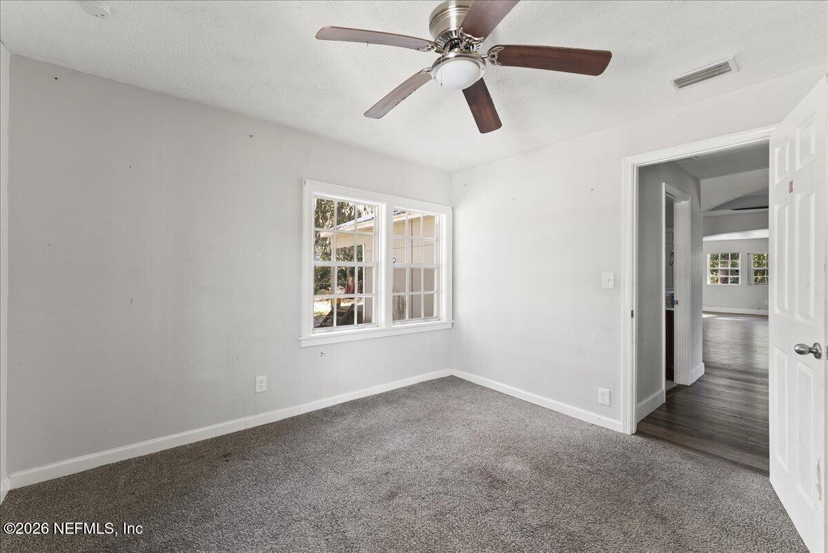 10565 Bessent Road North Jacksonville, FL 32218 - Photo 11 of 27 a view of an empty room with a window