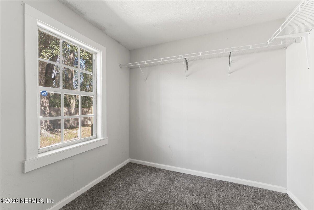 10565 Bessent Road North Jacksonville, FL 32218 - Photo 20 of 27 a view of an empty room with a window