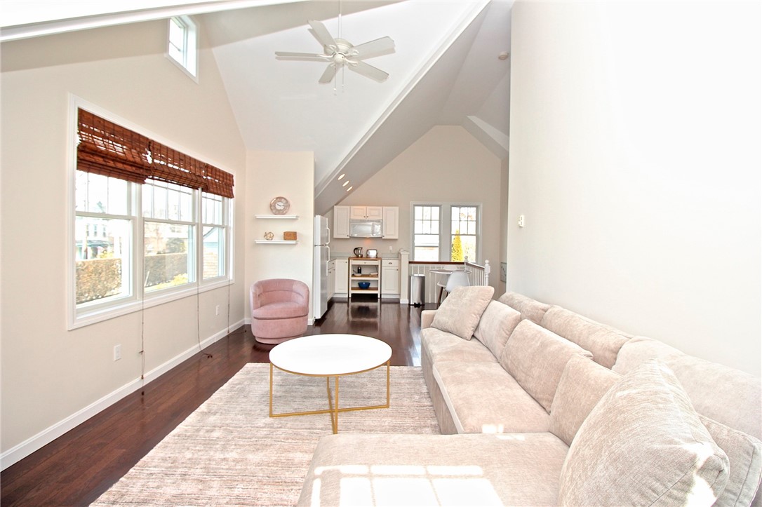 190 Coggeshall Avenue Newport, RI 02840 - Photo 43 of 50 Living room w/pull out/ view to kitchenette & stairway
