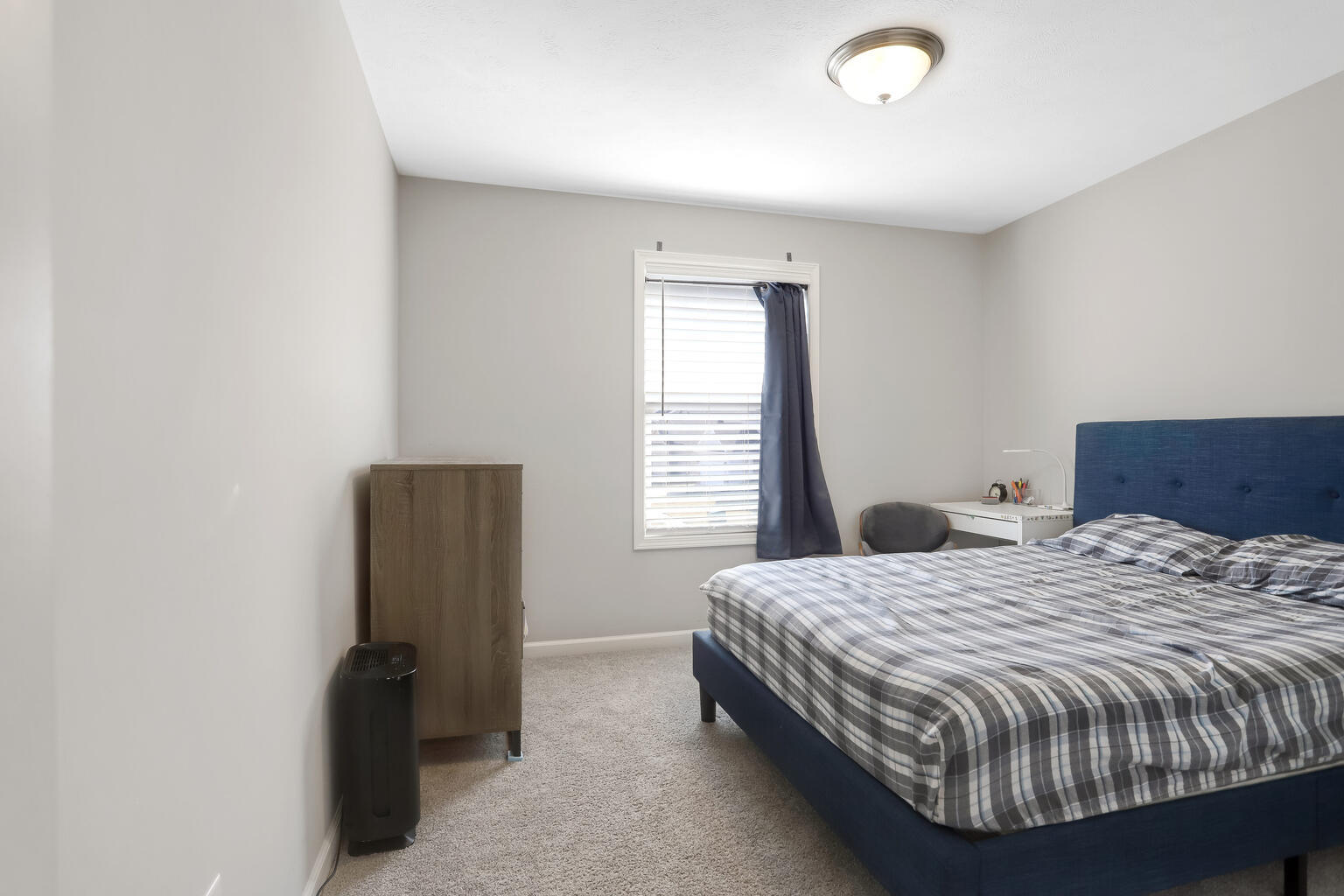 807 Cates Drive Mahomet, IL 61853 - Photo 19 of 33 a bedroom with a bed and a window