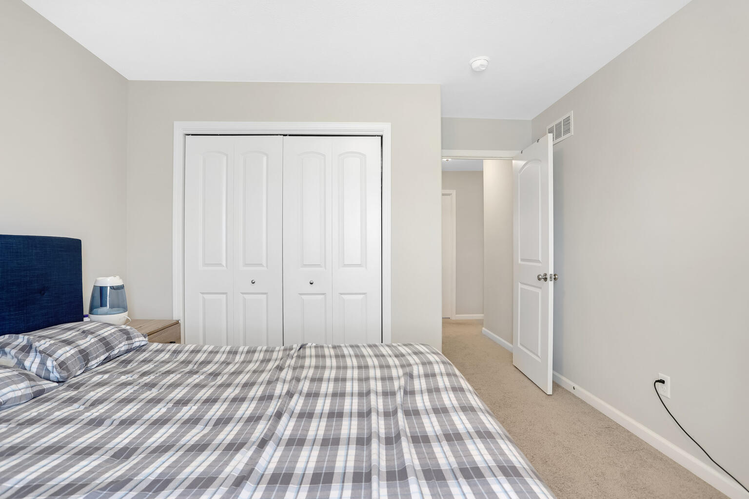 807 Cates Drive Mahomet, IL 61853 - Photo 20 of 33 a bedroom with a bed and a rug