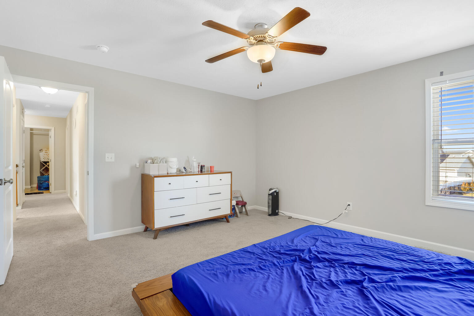 807 Cates Drive Mahomet, IL 61853 - Photo 24 of 33 a view of a bedroom with furniture and windows