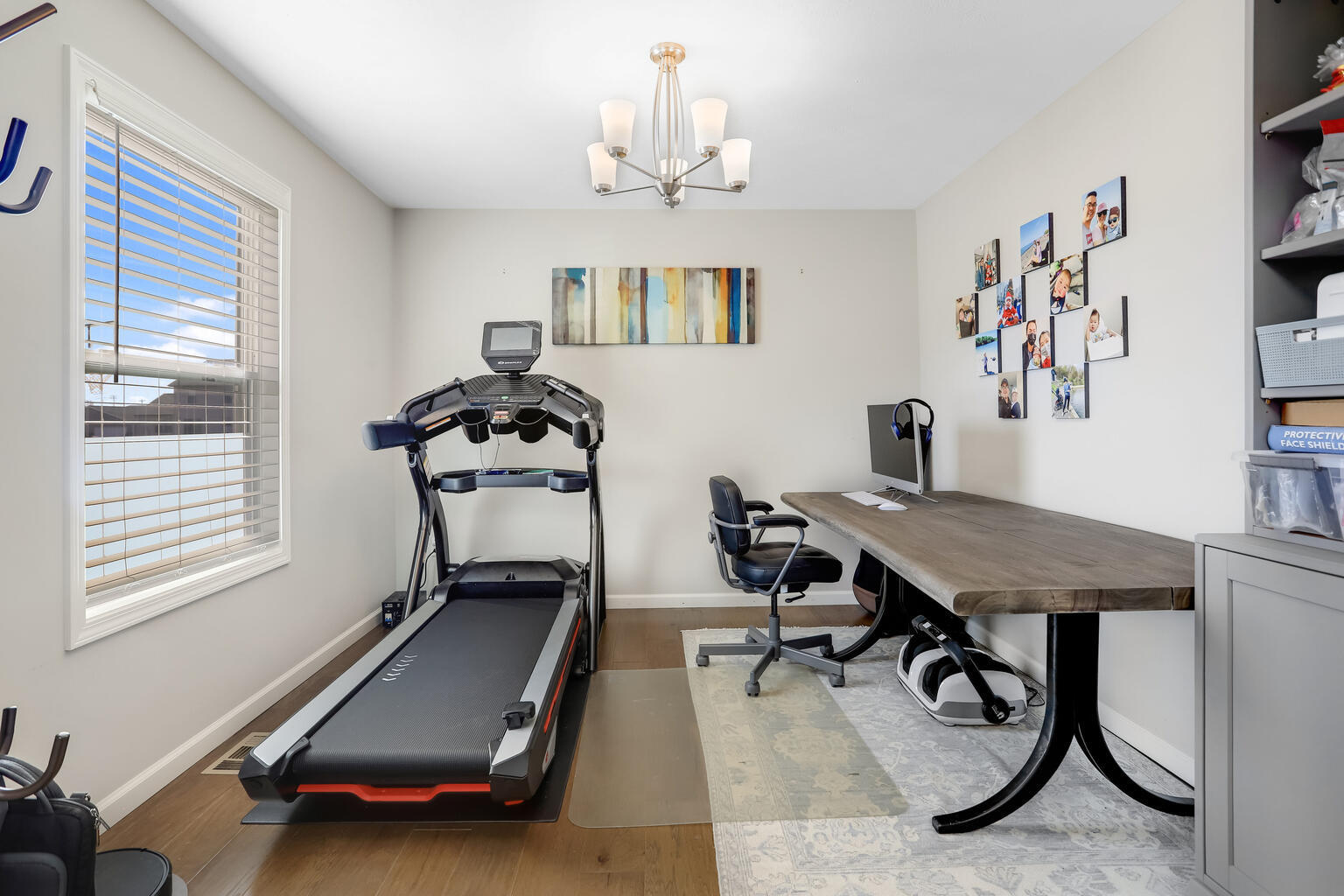 807 Cates Drive Mahomet, IL 61853 - Photo 6 of 33 a room with gym equipment and a window