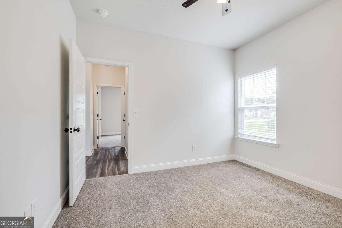 208 Timberlake Lane Guyton, GA 31312 - Photo 23 of 24 a view of a room that has a window in it
