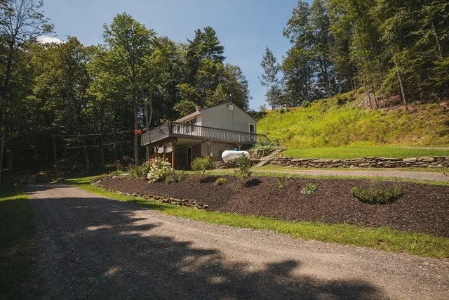 a view of a yard with an outdoor space