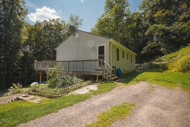 a view of backyard of house