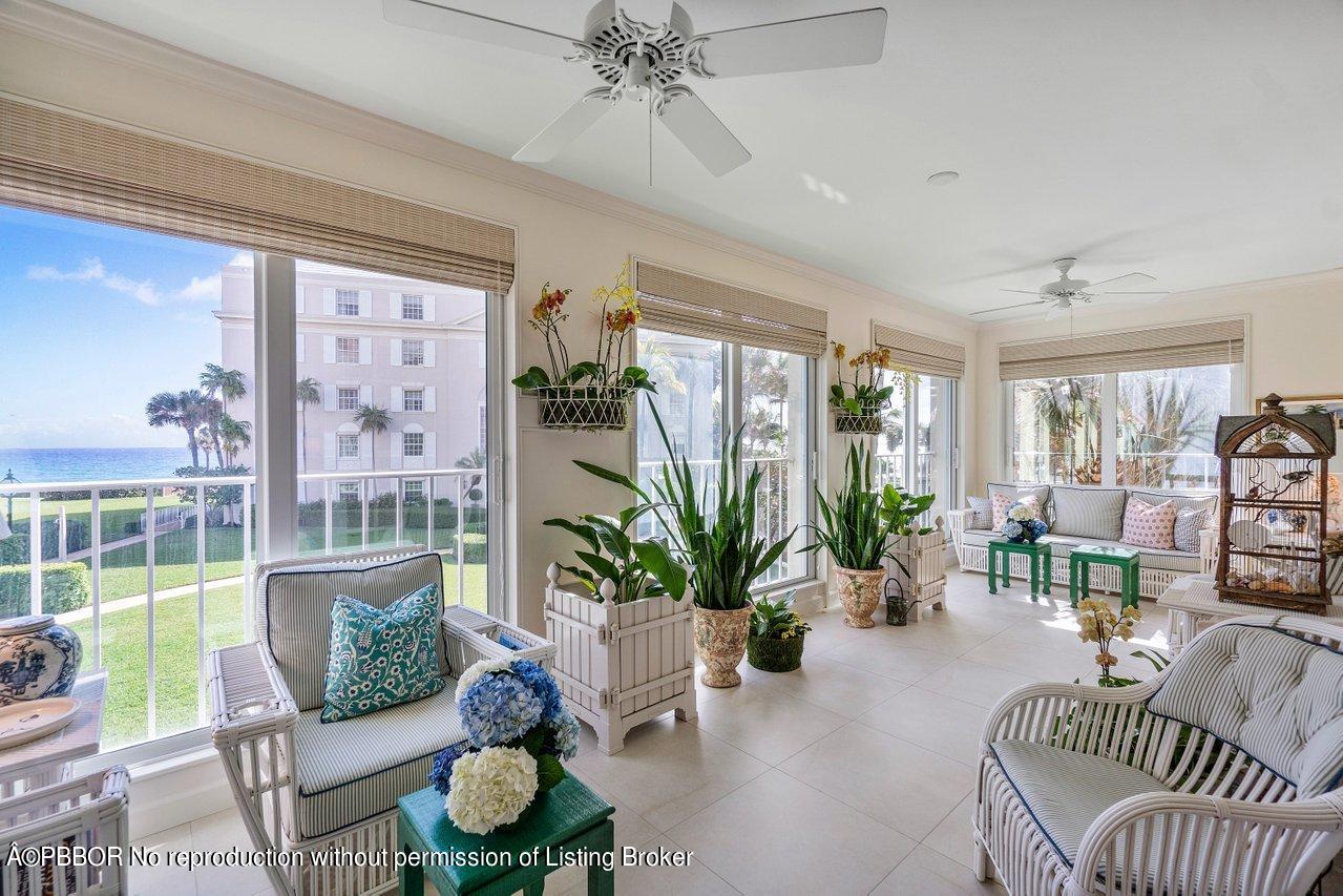 4333 North Ocean Boulevard, Unit BS2 Boca Raton, FL 33431 - Photo 5 of 22 a living room with furniture potted plant and a large window