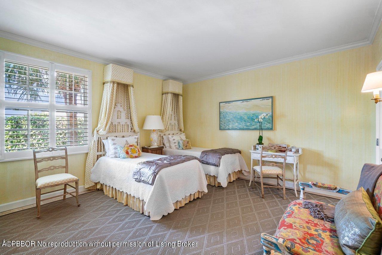 4333 North Ocean Boulevard, Unit BS2 Boca Raton, FL 33431 - Photo 9 of 22 a bedroom with a bed and a large window