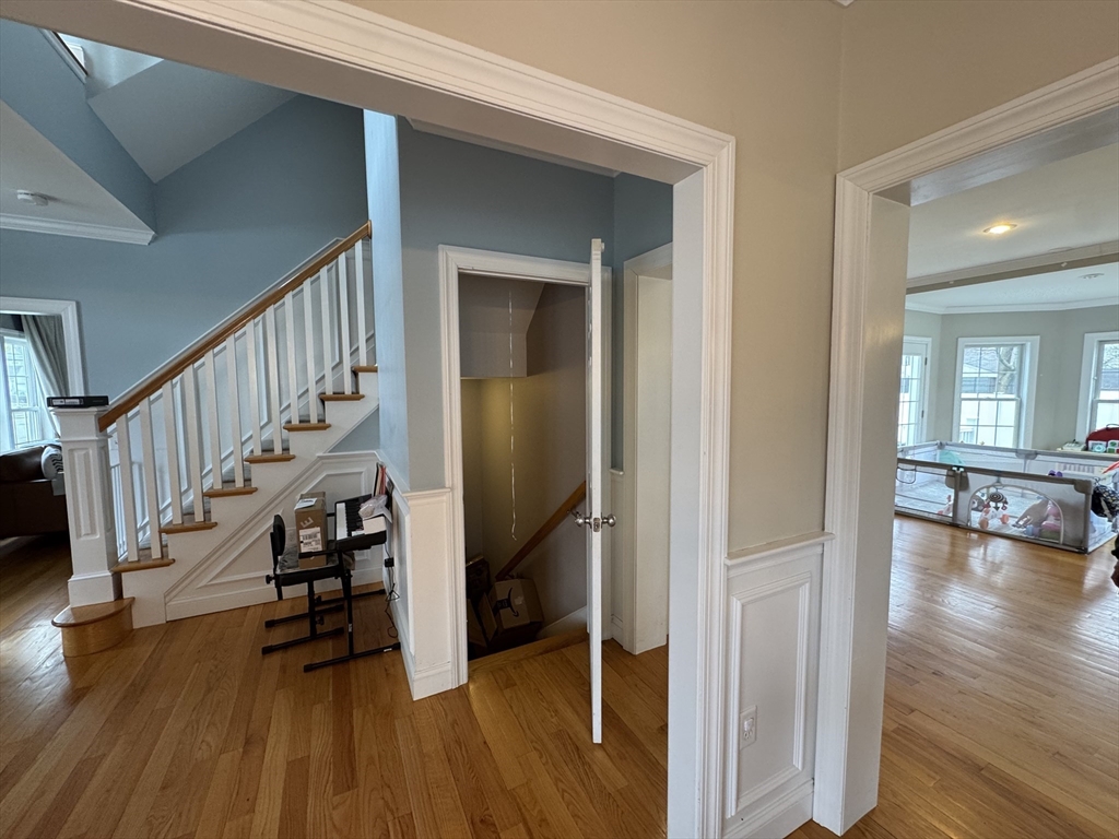 43 Canterbury Road Waltham, MA 02453 - Photo 12 of 42 a view of entryway and hall with wooden floor
