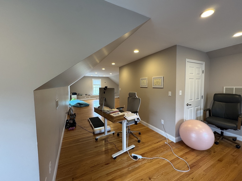 43 Canterbury Road Waltham, MA 02453 - Photo 15 of 42 a room with wooden floor and furniture