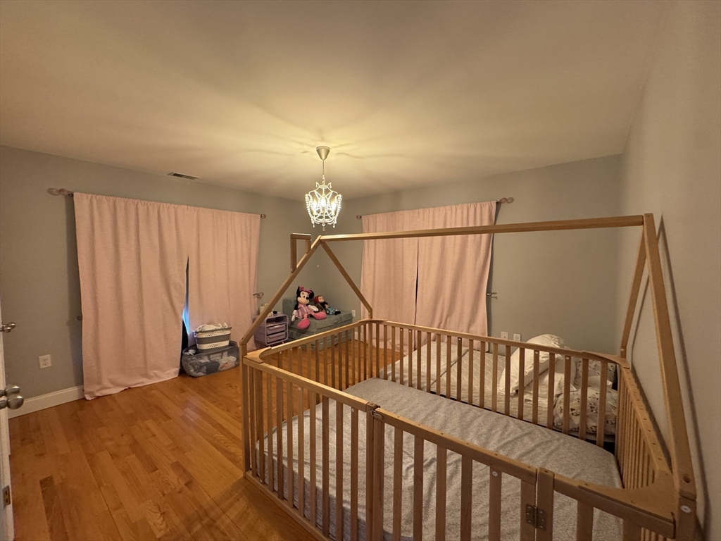 43 Canterbury Road Waltham, MA 02453 - Photo 19 of 42 a view of entryway with wooden floor
