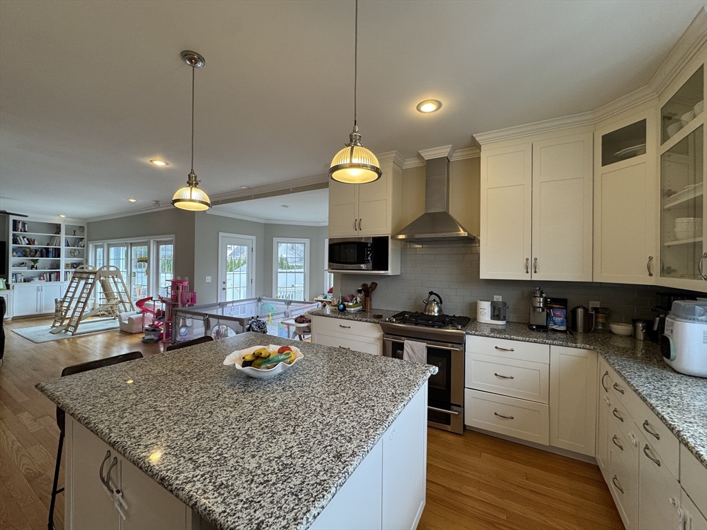43 Canterbury Road Waltham, MA 02453 - Photo 2 of 42 a kitchen with stove and cabinets